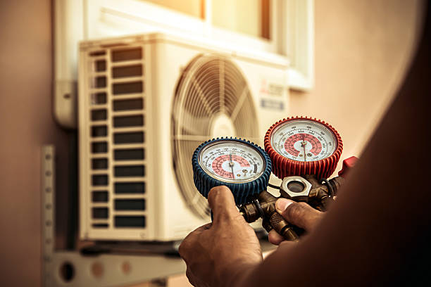 Professional Air Conditioning Service technician working in Lexington, TN